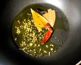 A picture of step 3 of Thankuni Pata Diye Musurir Dal (Centella Leaves Cooked with Red Lentils - Bong Style).
