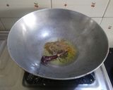 A picture of step 1 of Gujarati lunch (rasadar aloo sabji, amrakhand, puri, dal, rice).