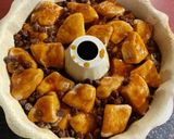 A picture of step 7 of Peanut Butter & Chocolate Monkey Bread.