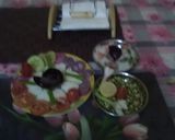 A picture of step 10 of Muli ka paratha with salad, curd, tomatoe chutney & dhaniya chutney.