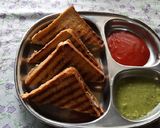 A picture of step 7 of Brown bread Potato stuff peanuts butter grilled sandwich.