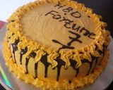 A picture of step 8 of Red velvet cake with a chocolate ganache cream frosting.
