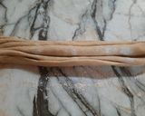 A picture of step 2 of Lacha paratha.