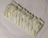 Foto del paso 5 de la receta: Trenza de hojaldre rellena de pollo al curry