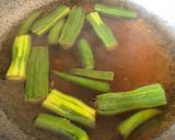 A picture of step 2 of Pumpkin Drumstick curry.