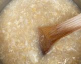 A picture of step 4 of Rice porridge with crab stock.