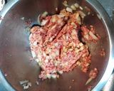 A picture of step 2 of Ground meat rolled in cabbage leaves.