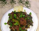 A picture of step 10 of Bhindi Gosht (okra).
