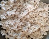 A picture of step 1 of Coconut laddus.