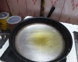 A picture of step 7 of Besan k dahi baray.