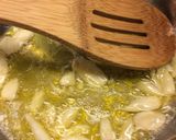 A picture of step 1 of Baked Goat Brie in Spicy Garlic Tomato Sauce.