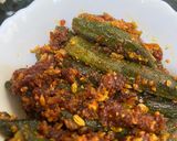 A picture of step 7 of Paneer Aloo stuffed bhindi with achari masala.