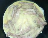 A picture of step 4 of Nduma/arrow root omelette.