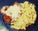 Foto del paso 6 de la receta: Milanesas de pollo con queso y papas fritas