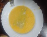 Foto del paso 3 de la receta: Merluza empanada con papas cocidas, zanahoria y huevo duro