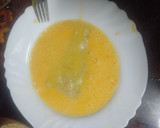 Foto del paso 3 de la receta: Merluza empanada con papas cocidas, zanahoria y huevo duro