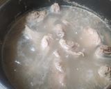 A picture of step 1 of Honey-Glazed Pork Ribs in a Pan.