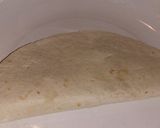 A picture of step 2 of My cheese and cherry tomato quesadilla.