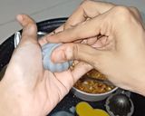 A picture of step 7 of Blue Pea Cranberry Ukdiche Modak.