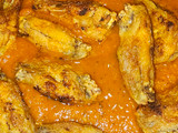 Alitas de pollo en salsa de tomate