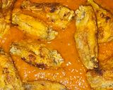 Foto del paso 3 de la receta: Alitas de pollo en salsa de tomate
