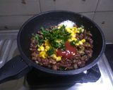 A picture of step 3 of Mexican beans enchiladas.