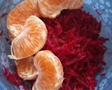 A picture of step 1 of Orange pink salad.