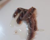A picture of step 2 of Buttered Anchovies, Eggs with a side of Hotdog Rounds.