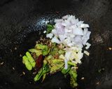 A picture of step 2 of Green pigeon pea usli (stir fried lentils).