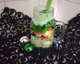 A picture of step 10 of Green Custard with fruits.