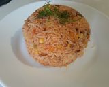 A picture of step 6 of Red Rice with Corn.