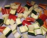 A picture of step 1 of Garlic roasted veg with oven baked salmon.