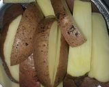 A picture of step 2 of Garlic buttery potato wedges.