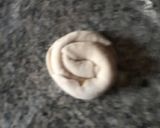 A picture of step 6 of Katmer/layered flat bread.