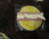 Foto del paso 2 de la receta: Salchichas envueltas rellenas de queso saborizadas