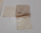 A picture of step 6 of Chicken cheese pocket parcel.