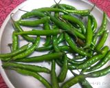 A picture of step 1 of Green chilli pickle.