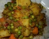A picture of step 7 of Spicy Potato Curry with Carrots and Peas.