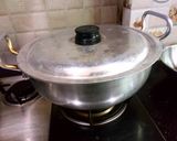 A picture of step 6 of Bhounwa kadu chicken.