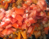 Foto del paso 4 de la receta: Potaje de garbanzos con calamares 🦑 y almejas