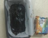 A picture of step 8 of Chocolate Biscuit Cake with Sugar coated Coconut Biscuits.