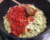 Une image de l'étape 8 de Pois chiches bruns aux tomates, oignon et épices.
