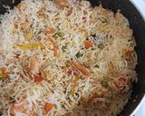 A picture of step 5 of Tom yum shrimp rice.