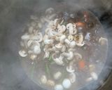 A picture of step 6 of Oxtail Potjie.