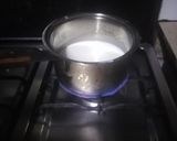 A picture of step 1 of Orange coloured Egg Pudding.