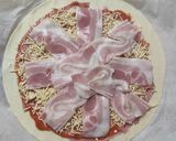 Foto del paso 4 de la receta: Empanada de hojaldre de jamón, queso y bacon