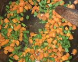 A picture of step 1 of Stir fried rice, chicken stew and fried plantain.