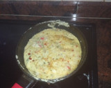 Foto del paso 3 de la receta: Bocadillo de tortilla de papas cocidas, bacalao y pimiento