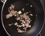 A picture of step 2 of Crushed peas, with mint, garlic and shallots.