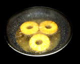 Foto del paso 2 de la receta: Piña caramelizada con miel